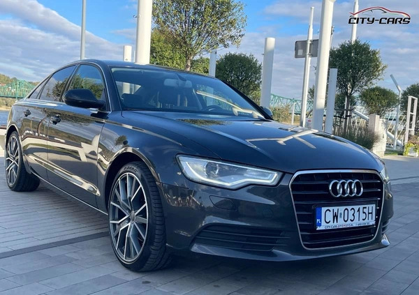 Audi A6 cena 77600 przebieg: 215000, rok produkcji 2014 z Sejny małe 529